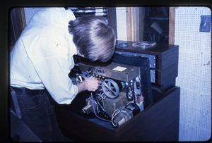 1978 WRSU Orientation Slide Show<br/>Production <br> Checking out the Scully Tape Machine Tom Chabrack CE<br>Slide #05