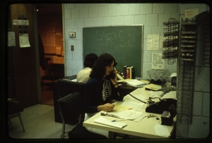 1978 WRSU Orientation Slide Show<br/>Another View of the News room - Maria Dandola<br> No Computers Back then<br>Slide #22