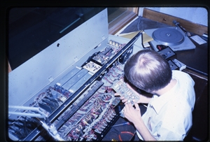 1978 WRSU Orientation Slide Show<br/>Checking the Production Board with Tom Chabrack<br>Slide #29
