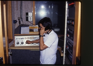 1987 WRSU Orientation Slide Show<br/>News Production with Mike Reed<br>Producer Console<br>Slide #08