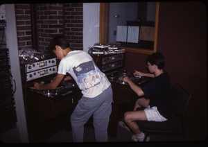1987 WRSU Orientation Slide Show<br/>Editing Tapes on the Scully in Production<br>Unknown, Mike Reed<br>Slide #27